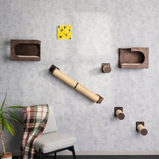 Cat House with Sisal Step and Scratching Post: Wall-mounted wooden cat furniture set featuring two enclosed hideaways, three sisal-wrapped climbing steps, and a long scratching post. Complemented by a yellow artwork and partial view of a chair with plaid throw.